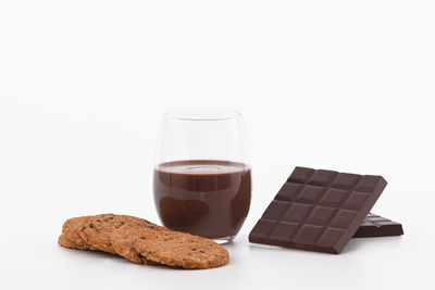 Close-up of drink against white background