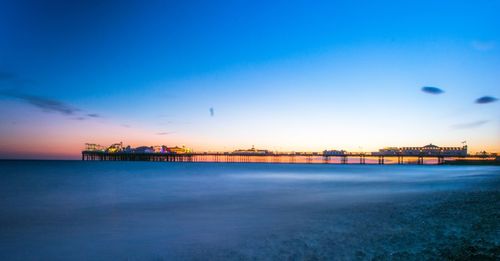 View of sea against blue sky during sunset