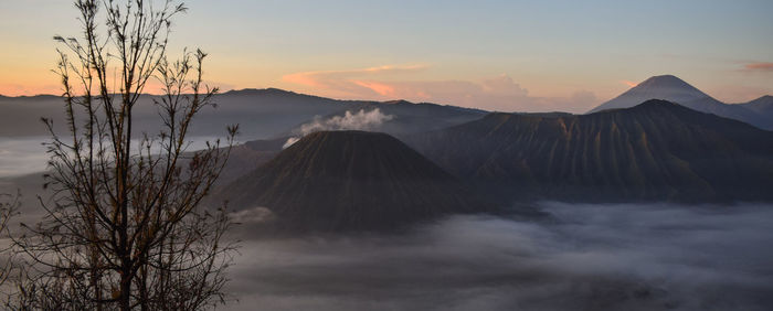 View of volcanic mountain during sunset