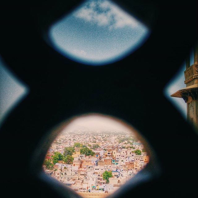 architecture, built structure, indoors, building exterior, cityscape, high angle view, window, city, residential structure, residential building, aerial view, no people, house, illuminated, residential district, crowded, sky, night, building, town