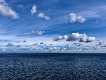 Scenic view of sea against blue sky