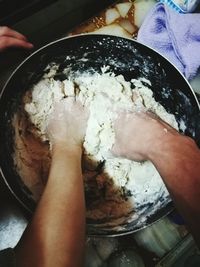 Close-up of hand holding ice cream