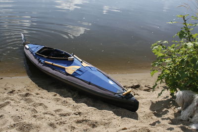 High angle view of boat moored on shore