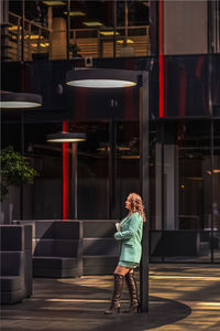 Rear view of woman walking in city