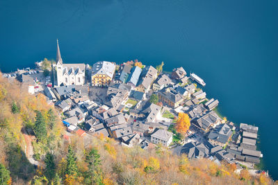 High angle view of townscape by sea