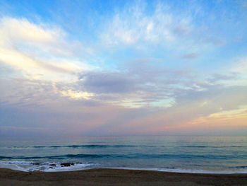 Scenic view of sea at sunset