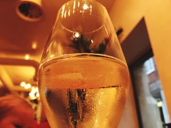 Close-up of beer glass on table