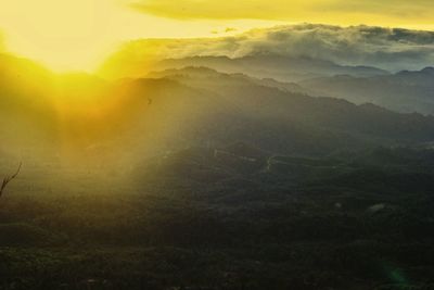 Scenic view of landscape against sky during sunset