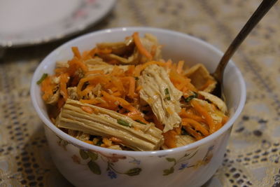 Close-up of noodles in bowl on table