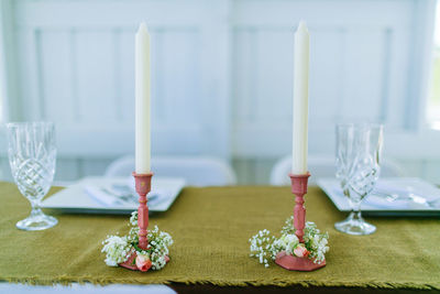 Wine glasses on glass table