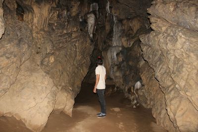 Woman standing on rock formation