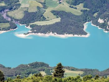 Panoramic view of sea and mountains against sky