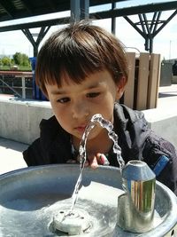 Close-up portrait of boy holding ice cream