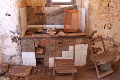 Damaged chairs in abandoned building