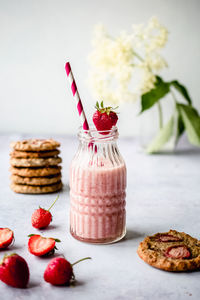 Close-up of fruits in jar on table