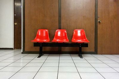 Red bleachers in waiting room