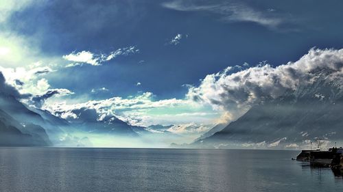 Scenic view of sea against cloudy sky