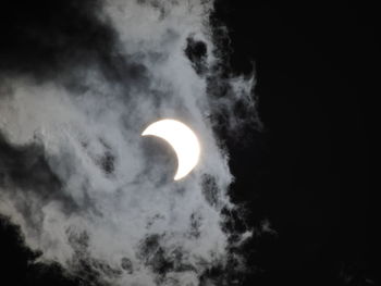 Low angle view of moon against sky at night