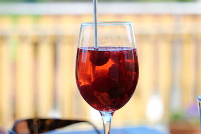 Close-up of wineglass on table