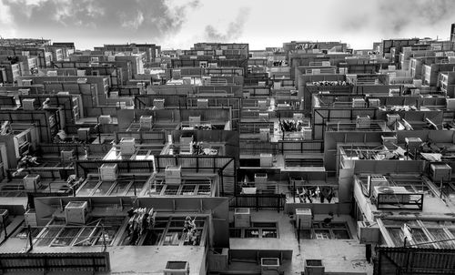 Aerial view of city against sky