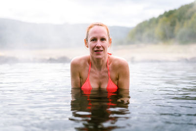 Portrait of woman in hot spring