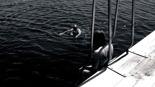 Boats in calm lake