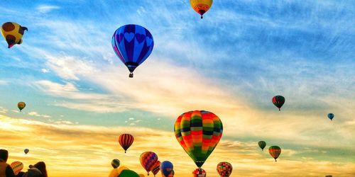 Low angle view of hot air balloons against sky