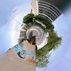 Digital composite image of building and trees against sky