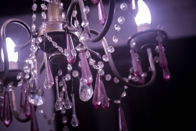 Low angle view of illuminated chandelier