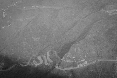 High angle view of footprints on beach