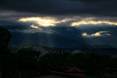 Scenic view of cloudy sky at sunset