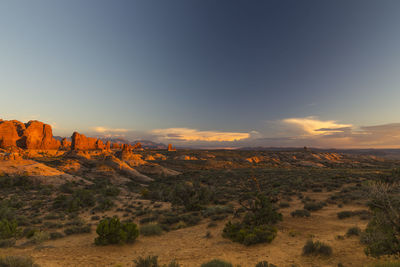 Scenic view of landscape against sky during sunset