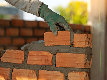 Close-up of man working on wood