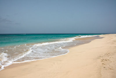 Scenic view of sea against clear sky