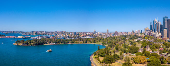 Beautiful panorama of the sydney harbour district with harbour bridge, botanical garden.