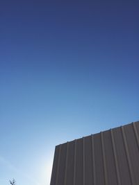 Low angle view of building against blue sky