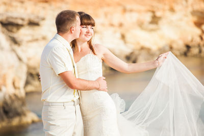 Couple holding hands