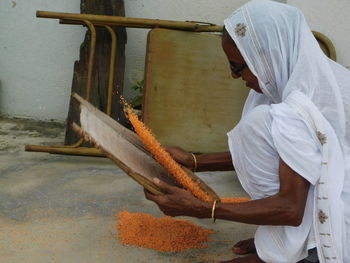 Man working on cutting board