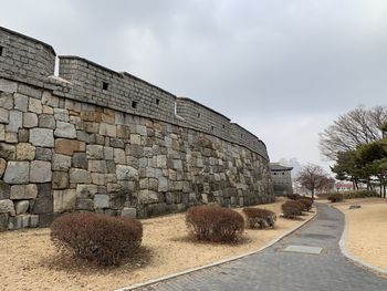 View of stone wall against sky