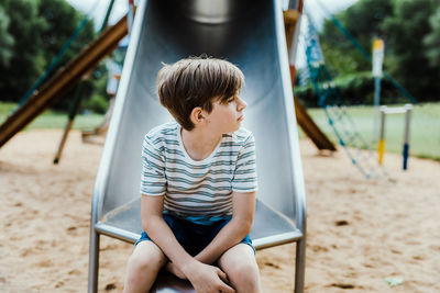 Teen boy brood over growing up, getting mature and get a part of society