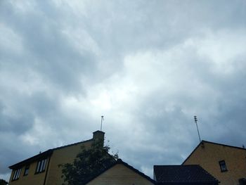 Low angle view of houses against sky