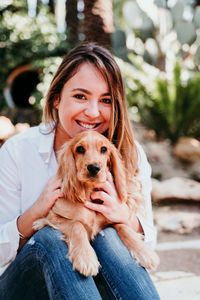 Woman with dog at park