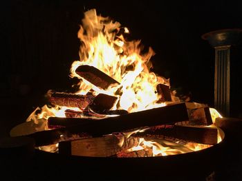 Close-up of fire burning at night