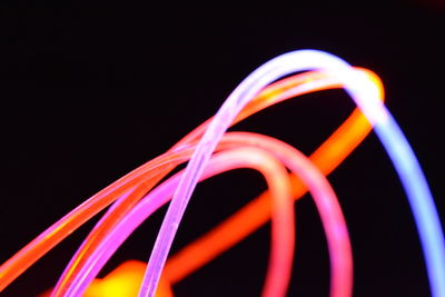 Close-up of multi colored lights against black background