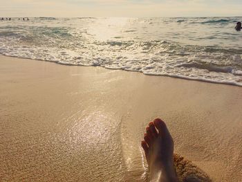 Low section of person on beach