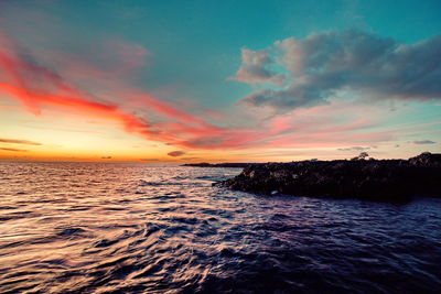 Scenic view of sea against sky during sunset