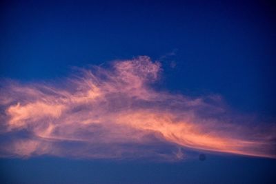 Low angle view of dramatic sky during sunset