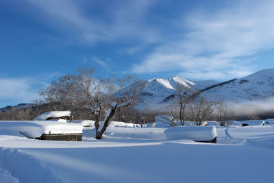 Snowcapped mountains against sky