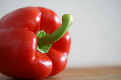Close-up of red bell peppers on table