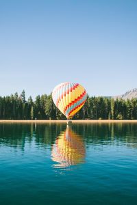 Low angle view of hot air balloons against sky